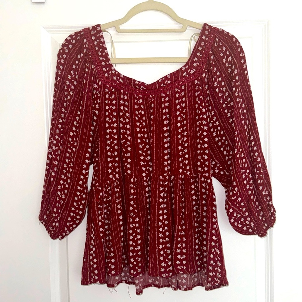 Red and white floral blouse